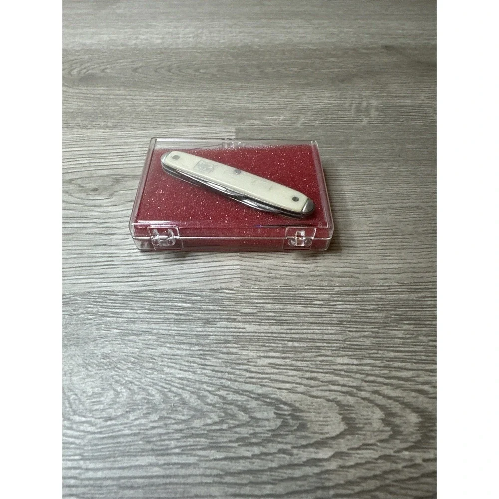 VTG.  2 BLADE KNIFE ADVERTISING SENTER-SANDERS‎ TRACTOR CORPORATION 